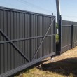 Забор из профнастила с откатными воротами и калиткой