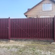 Откатные ворота из евроштакетника с обшивкой Шахматка механические на ж/б
